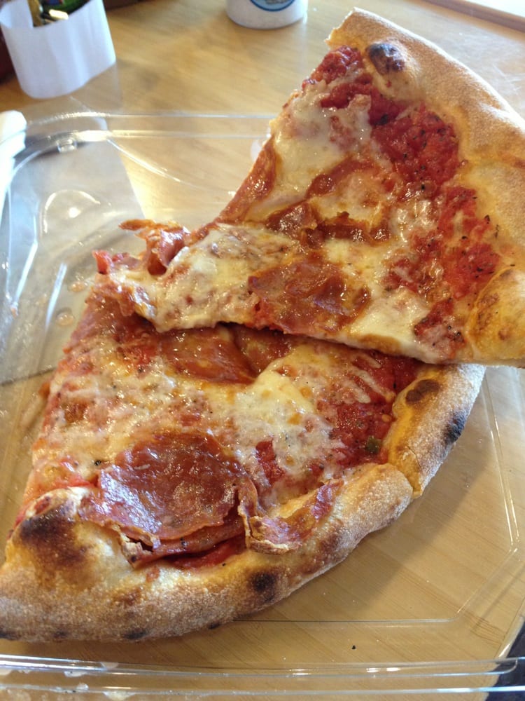 Gross, doughy, greasy, undercooked pizza. Yelp