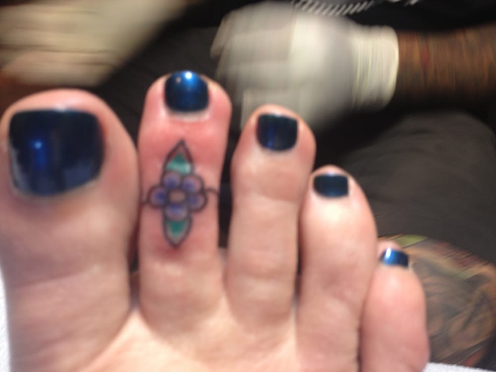 toe ring tattoo by bobby yelp toe ring tattoo by bobby yelp