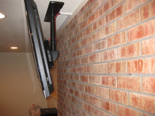 Ceiling Installation Of A TV Above A Brick Fireplace Yelp